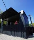 Modular 4×2 M Black Flat Pack Container – Customizable for Bars, Cafes, & More - OneStop Container Store
